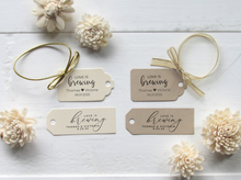 Four 'Love is Brewing' tags by Lulu Island Honey.