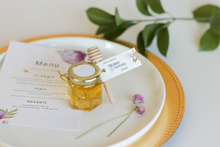 2 oz honey jar in luxe style with white tag and gold loops, handmade by Lulu Island Honey. Perfect for wedding favors or tea parties.
